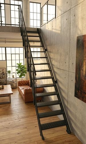 A black metal staircase with a banister against a concrete wall in a modern loft with wooden flooring and a large window front.