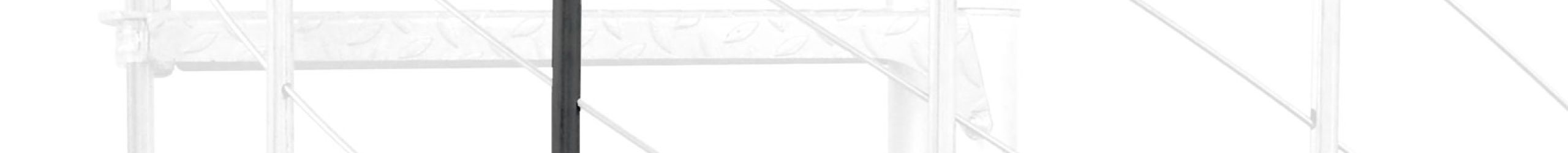 Height extension for the Spino Zink Color staircase in anthracite metal. A detail of the additional step, the balusters and the handrail is shown.