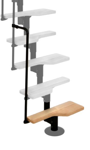 A toddler plays with colorful toys on the floor in front of the mounted "Annika" wooden child safety gate. The gate is installed between two walls, separating the play area from the kitchen behind.