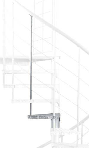 A toddler plays with colorful toys on the floor in front of the mounted "Annika" wooden child safety gate. The gate is installed between two walls, separating the play area from the kitchen behind.