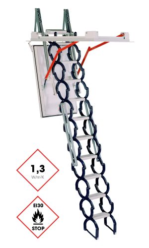 A toddler plays with colorful toys on the floor in front of the mounted "Annika" wooden child safety gate. The gate is installed between two walls, separating the play area from the kitchen behind.