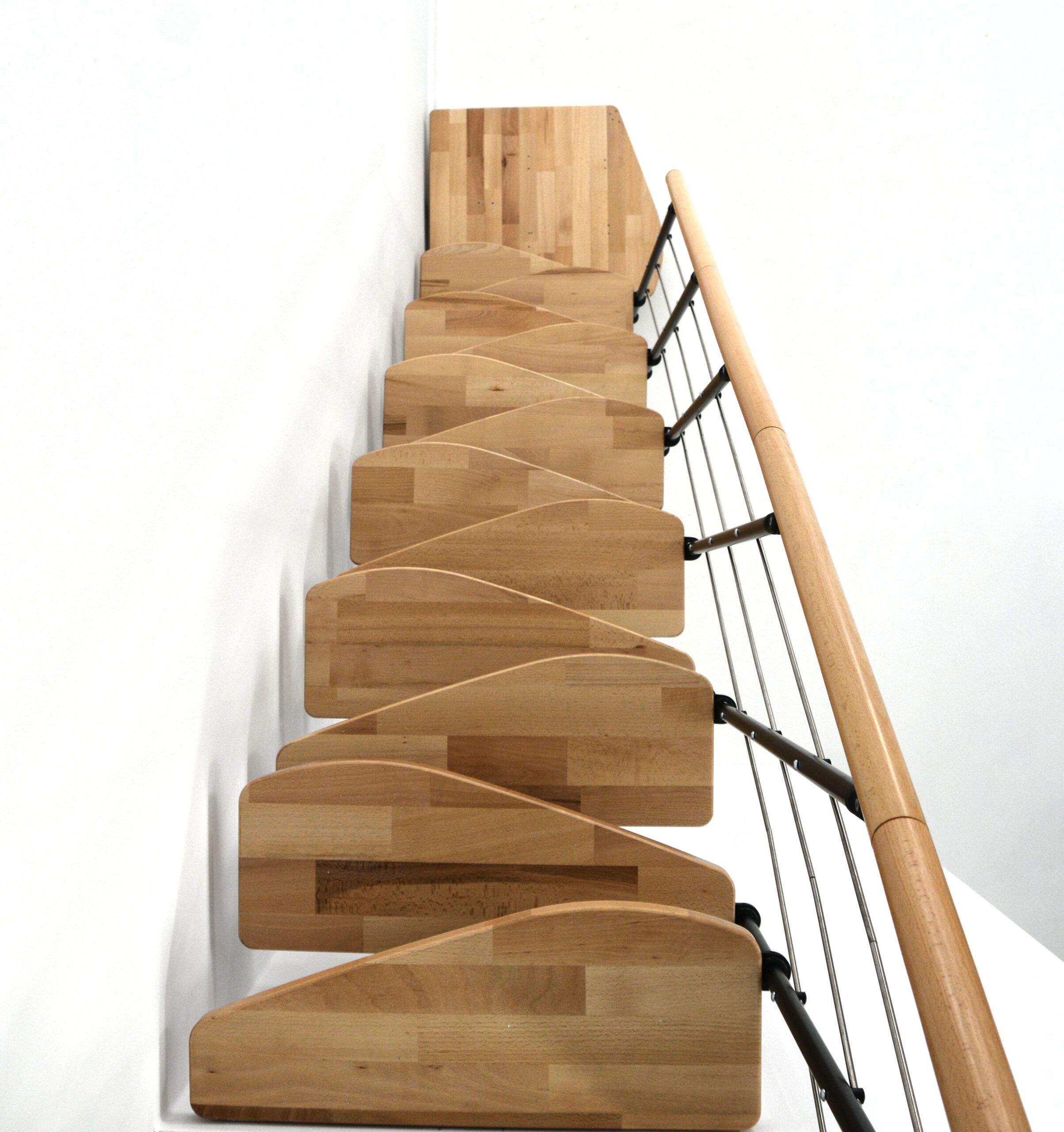 Quatro Turn central stringer staircase with quarter-turn winder beech steps, black metal railing with horizontal bars, and a wooden handrail, viewed from above.