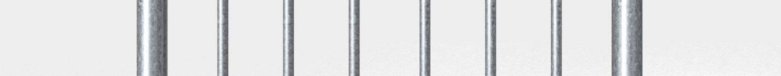 Balustrade for the outdoor spiral staircase Rondo Zink Smart. The horizontal handrail is made of grey PVC, and the vertical bars are galvanized steel, positioned between two sturdy metal posts.