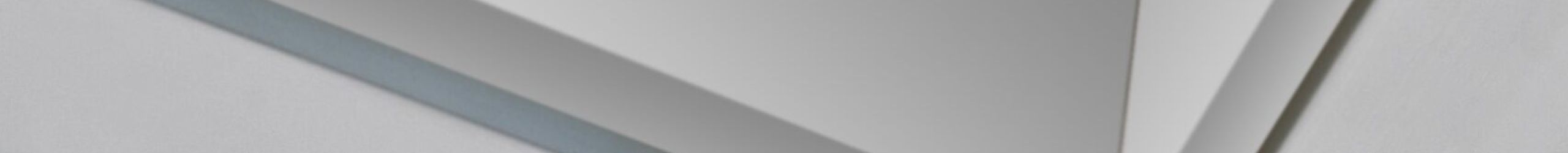 Detail view of a modern white trim strip of the “Minka Fix” type, 18 mm wide, installed around a ceiling opening with a smooth wall junction.