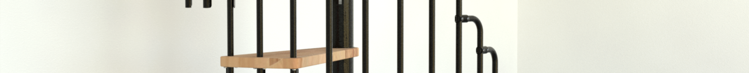 Spiral staircase Paris with steps in beech and black steel banisters with rounded bars at the top. The staircase is located in a modern room.