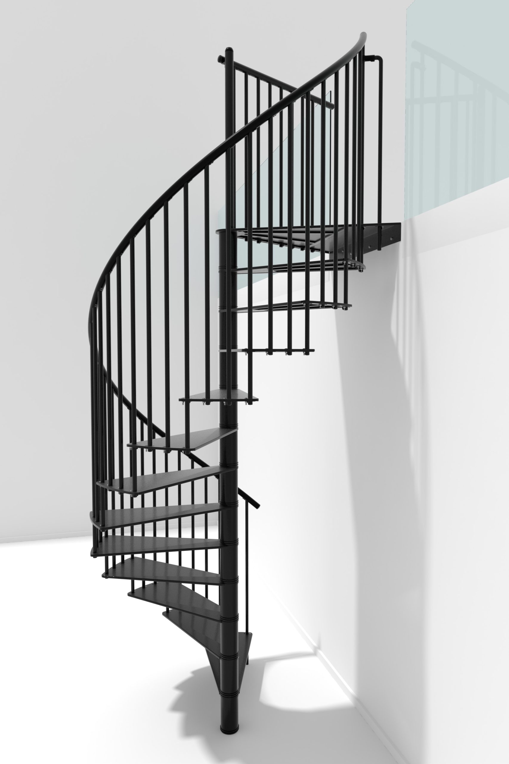 Portofino spiral staircase made of black metal with vertical railing bars and a PVC handrail, installed in a modern white interior. The staircase elegantly spirals upwards.