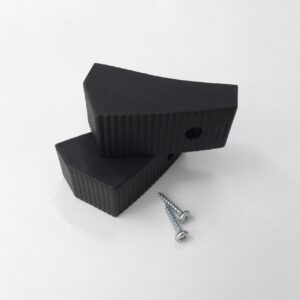 Two black stair shoes for wooden stairs with a ribbed surface, including two mounting screws, placed on a light background.