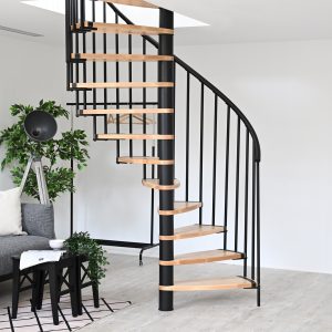The Luna spiral staircase impresses with its modern design featuring light wooden steps and a black metal frame. Perfectly suited for stylish and space-saving living concepts.