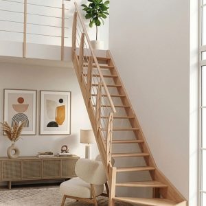 Classic Turn wooden staircase with a space-saving quarter-turn design, featuring solid timber treads, a matching wooden handrail, and stainless steel cable balustrades, elegantly integrated into a bright, modern living space.