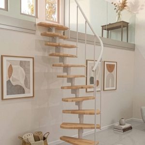 Monte Carlo space saving staircase in white with solid beech wood treads, a central steel column, and a curved handrail, providing a compact and elegant access solution in a bright, contemporary living space with a gallery level.