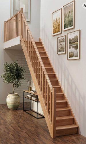 Home straight staircase in solid beech wood featuring closed risers, a classic vertical spindle balustrade, and a matching handrail, creating a warm and timeless focal point in a bright, modern interior.