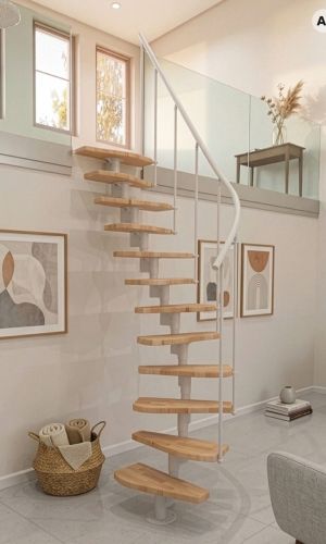 Monte Carlo space saving staircase in white with solid beech wood treads, a central steel column, and a curved handrail, providing a compact and elegant access solution in a bright, contemporary living space with a gallery level.