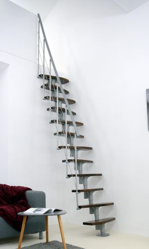 Straight Nizza space-saving staircase with alternating steps in walnut finish and a grey metal structure. The staircase is installed compactly along a white wall and features a side railing with horizontal bars and a grey handrail.