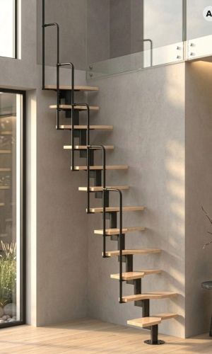 Twister space-saving staircase featuring a black powder-coated steel central support, solid beech wood treads, and matching black handrails, offering a compact and modern solution for accessing a gallery level in a contemporary home.