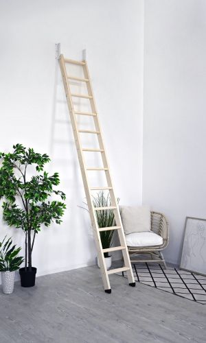 Woody space-saving staircase made of spruce with a straight, steep design and narrow treads. The staircase has no railing and is mounted space-savingly against the wall.