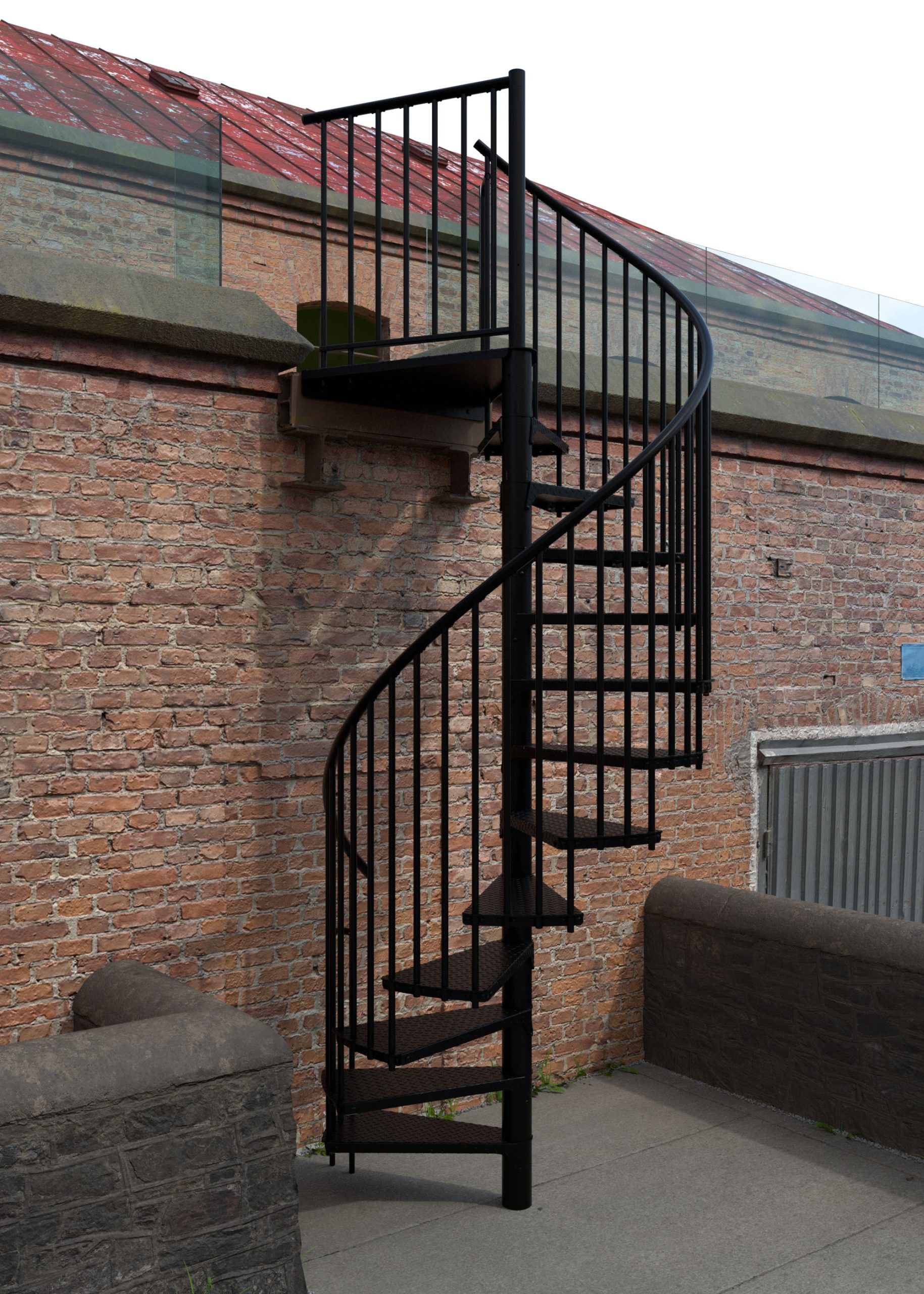 Außenspindeltreppe Rondo Zink Color in Schwarz vor einer Backsteinfassade. Die Treppe aus feuerverzinktem Stahl mit schwarzer Pulverbeschichtung verfügt über senkrechte Stäbe und Tränenblech-Stufen für sicheren Tritt im Außenbereich.
