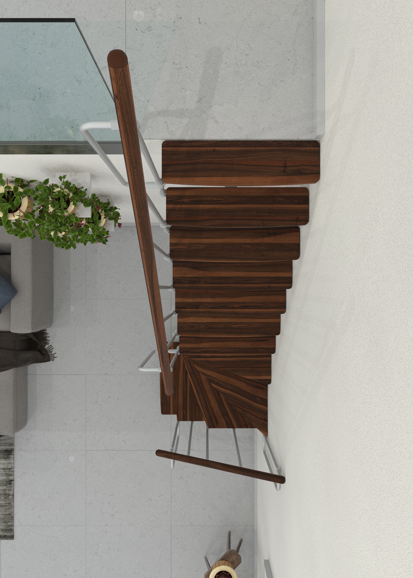 Mittelholmtreppe mit Stufen in Walnussoptik und weißem Metallgeländer, von oben aufgenommen. Die Treppe zeigt eine 180-Grad-Wendung entlang der Wand.