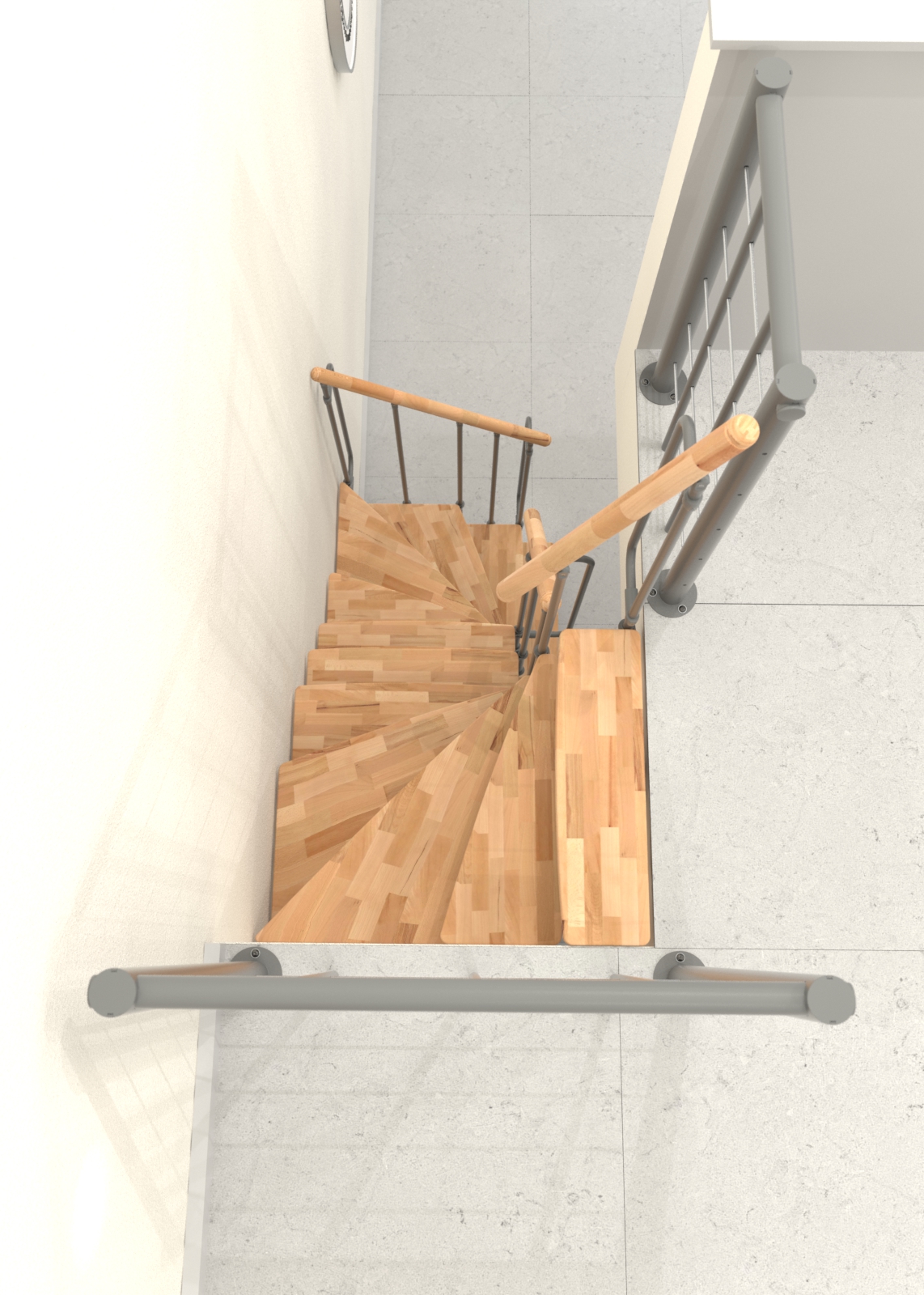Blick von oben auf die Joker Turn 180° Treppe mit Buchenholzstufen und grauer Metallkonstruktion. Der Handlauf aus Holz und das moderne Geländer bieten sowohl Sicherheit als auch ästhetische Eleganz.